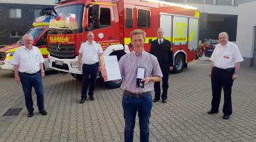 Ehrung Thomas Waschki Deutsche Feuerwehr-Ehrenmedaille (Copyright: Stadt Bocholt)